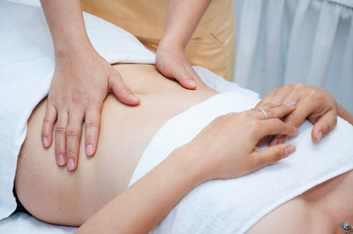 Giảm đau bụng kinh bằng massage bụng 1